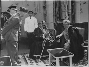 Franklin_D._Roosevelt_and_King_Ibn_Saud_of_Saudi_Arabia_at_Great_Bitter_Lake_in_Egypt_-_NARA_-_197295